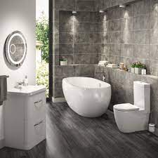 Modern bathroom suites a modern bathroom suite is a very broad term, and can encapsulate almost every design on the market today. Suite Configuration With The Pebble Freestanding Bath Cheap Bathroom Suites Bathroom Suites Uk Free Standing Bath Tub
