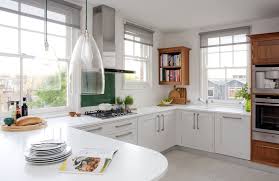 Kitchen windows should ideally let air and light into the room, as well as being easy to use and looks great. Two Uncovered Windows Transform Kitchen Into Light Filled Room