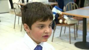 Kids show off their Miracle Tie designs