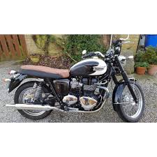 It is not the typical cafe racer handlebar, or the seat either. Motone Triumph Bonneville T100 Thruxton Scrambler Cafe Racer Seat Base Foam Kit