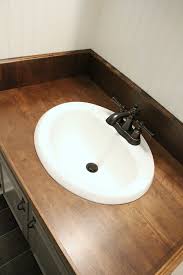 I am looking for ideas to paint the formica and the plastic sink in my bathroom. Diy Wood Bathroom Countertop An Easy Way To Change Your Vanity In 1 Weekend Noting Grace