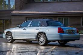 Image result for Light Ice Blue 2008 Town Car