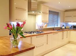 25% discount applies to corian, granite, quartz, recycled glass, silestone, slab tech, ceramica and 60mm solid wood. Cream Units Oak Worktops Modern Kitchen Oak Worktop Kitchen Design