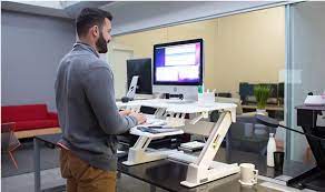 This footrest can help you get your feet. How An Ergonomic Desk Set Up Can Infuse Wellness Into Your Workday