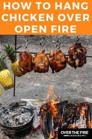How To Hang Chicken Over Open Fire Over The Fire Cooking Recipes Fire Cooking Campfire Food Cooking Over Fire