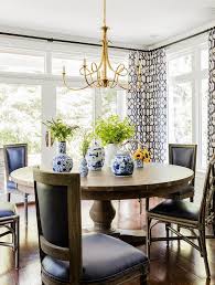 We've got extra large dining room tables savings and more. Round Dining Table And Black French Dining Chairs With Double Twist Large Chandelier Transitional Dining Room