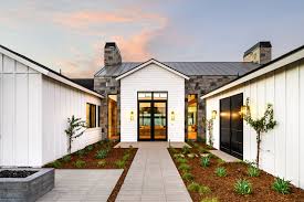 White siding house with metal roof. Photo 2 Of 15 In The Magnolia By Drewett Works Dwell