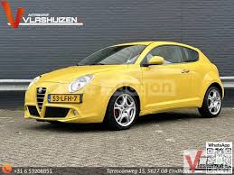 Image result for Canary Yellow 1985 Alfa-Romeo