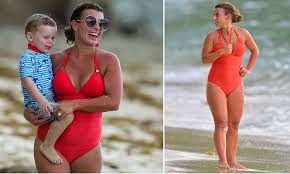 Coleen mcloughlin met her future husband, the manchester united and england forward wayne rooney, at the age of 12. Coleen Rooney Wears Plunging Red Swimsuit In Barbados Daily Mail Online