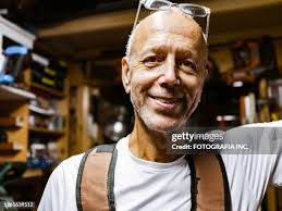 Portrait Of Jeweler In Workshop High-Res Stock Photo