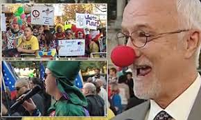 KKK marchers outnumbered 5 to 1 by anti-racist protesters dressed as clowns 