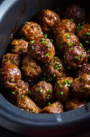 Easy appetizer or main dish. Slow Cooker Sticky Bacon Whiskey Meatballs Host The Toast