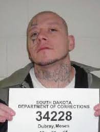 Escaped inmate died from gunshot to head; death considered homicide