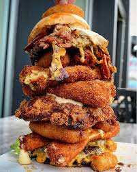 The breaded mozzarella recipe out of our category cheese! New Idea Food Know Anyone Who Could Eat A Burger Featuring A Fried Mac N Cheese Patty Four Fried Mozzarella Sticks Four Fried Hotdogs Two Fried Chicken Patties And Two Beef