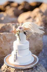 13 Whimsical Ways To Use Pampas Grass In Your Wedding Love Inc Mag Grass Cake Boho Wedding Cake Pampas Grass