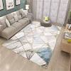 Consider positioning a long coffee table directly in front of the sofa. 3