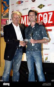 Producer Garth Porter (left, previously keyboardist with the band Sherbert)  with Jeremy Edwards of Jeremy Edwards And The Dust Radio Band, winners of  the Garth Porter Producers Award. The 2006 MusicOz Awards.