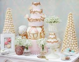 The centerpiece for the reception table is a hollowed out old stump with an array of an organic looking mix of flowers, berries and succulents that look a little wild and unrefined. Cinderella Wedding Theme Lovetoknow