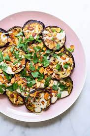 Easy Ottolenghi Inspired Roasted Eggplant With Tahini Sauce Spiced Almonds And Parsley The New Baguette E Eggplant Dishes Ottolenghi Recipes Roast Eggplant