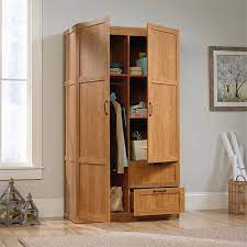 Choose from a variety of styles, like modern to traditional and everything in between. Sauder Select Wardrobe Armoire In Highland Oak 420063