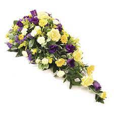 The color lavender has the characteristics of grace, beauty, respect, and femininity. Funeral Flowers Sheffield Blue Yellow Spray By Katie Peckett Flower Shop