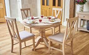 Next day delivery and free returns available. 106cm Cobham Oak Round Extending Single Pedestal Dining Table With 4 Big Cross Dining Chairs By Bridgman Archello