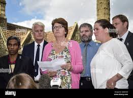 Rachel Fortune, mother of Charlotte Bevan, gives a statement to the waiting  media, with Pascal Malbrouck (left), boyfriend of Charlottes, and other  family and friends after the verdict in her inquest at