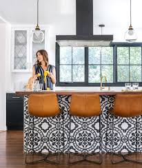 Metallic accents in minimalist kitchen by spandriwiedemann. A Stunning Home Renovation Brightens A Spanish Colonial Revival Home Home Renovation Home Decor Kitchen Home Decor