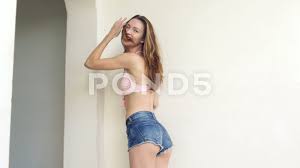 Hot girls in short shorts. Sexy Bikini Girl In Short Shorts At Beac Stock Video Pond5