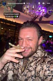 Conor McGregor poses with blunts during Snoop Dogg's visit to his pub as  UFC star makes boast in photo