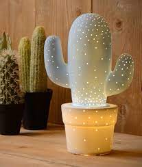 This is usually towards the blue and red parts of the spectrum. Ceramic Cactus Table Lamp