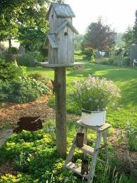 Image result for country bird feeders in their settings