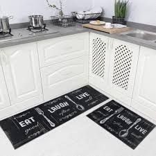 A creamy yellow rug looks fresh and homey in front of the kitchen sink. Buy Carvapet 2 Piece Kitchen Rug Set Non Slip Backing Mat Throw Rug For Kitchen Doormat Runner Rug Set Motto Design Black 17x48 17x24 Online In Italy B081jmyvgg