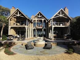 The units are housed in five small houses built in alpine style, with exterior finishes of traditional materials such as stone and wood. Brick Stone Wood Or A Mix Mccamy Construction Mccamy Construction