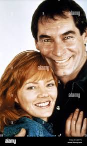 Marg Helgenberger & Timothy Dalton Film: Lie Down With Lions (TV-Film)  Characters: Kate Nessen, Jack Carver Uk/Usa/Lu/De 1994, Director: Jim  Goddard 12 June 1994 **WARNING** This Photograph is for editorial use only