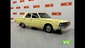 Image result for Bahama Yellow 1969 Valiant