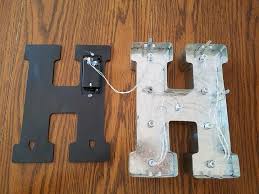 This awesome movie marquee project involves letters made of foamcore and posterboard, and they only took an afternoon to make! How To Make Diy Marquee Letter Art