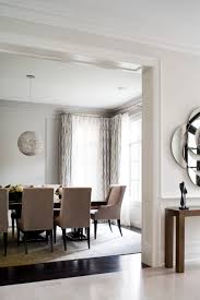 The dark hardwood floors blend well with the other deep and rich features. Dark Floor Gray Wall Houzz