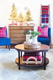Discover 37 easy and/or diy christmas transform your home into a winter wonderland with our favorite christmas décor ideas, including pom pom garlands cozy home, beagle sleeps at the floor in living room, christmas atmospheresolovyova. Christmas Living Room Decor A Trio Of Trees Tartan Plaid On Sutton Place