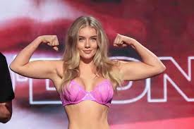 Glam boxer who kissed opponent and went viral teases huge career change -  Daily Star