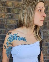 Who's the best tattoo artist or shop in Longmont that's open today?