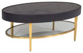 Handmade in indonesia using abaca, a sustainable material derived from banana leaves, this intricate coffee table combines contemporary style with natural, organic elements. Modern Oval Black Leather Metal Coffee Table Ellipse Gold Round Minimalist Contemporary Coffee Tables By My Swanky Home Houzz