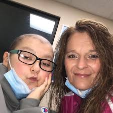 This photo was taken fall 2011.My daughter Misty and I at our last women's  retreat together. She was battling cervical cancer, she was going through  radiation was burnt and so sick .