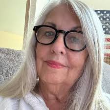 Yes! I love going down memory lane with each ornament.