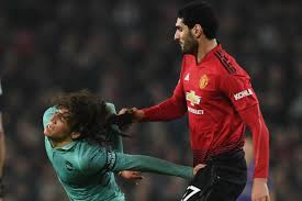 Geundouzi fumes at the way fellaini had pulled on his hair to stop his runcredit: Fellaini Tries To Be Naughty Against Guendouzi Man Utd Core