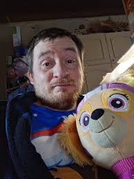 Here I am with my Skye plush toy from Paw Patrol!