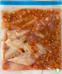 There are 256 calories in 1 serving of fish tacos.: Easy Salsa Fish Tacos Freezer Meals 101