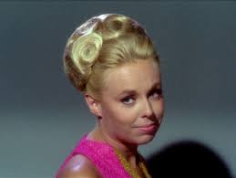 actress Sarah Marshall appeared in 1962 in Twilight Zone as the mother of  "Little Girl Lost", and then as Kirk's ex-girlfriend Janet Wallace in "The  Deadly Years"