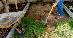 Dig to clear overgrown weeds How To Remove Grass To Start A Garden And Not A Weedy Nightmare