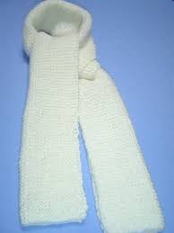 Knitting the scarf in two pieces and sewing them together in the middle allows the loops on both sides to fall downward and lie flat. Scarf Knitting Patterns